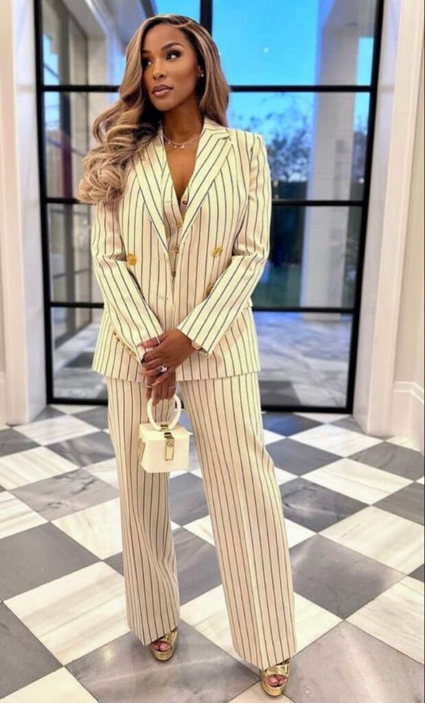 5. Lakers Courtside – Power Suit Goals