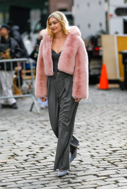 2. Chic in Grey Suit and Faux-Fur Glam